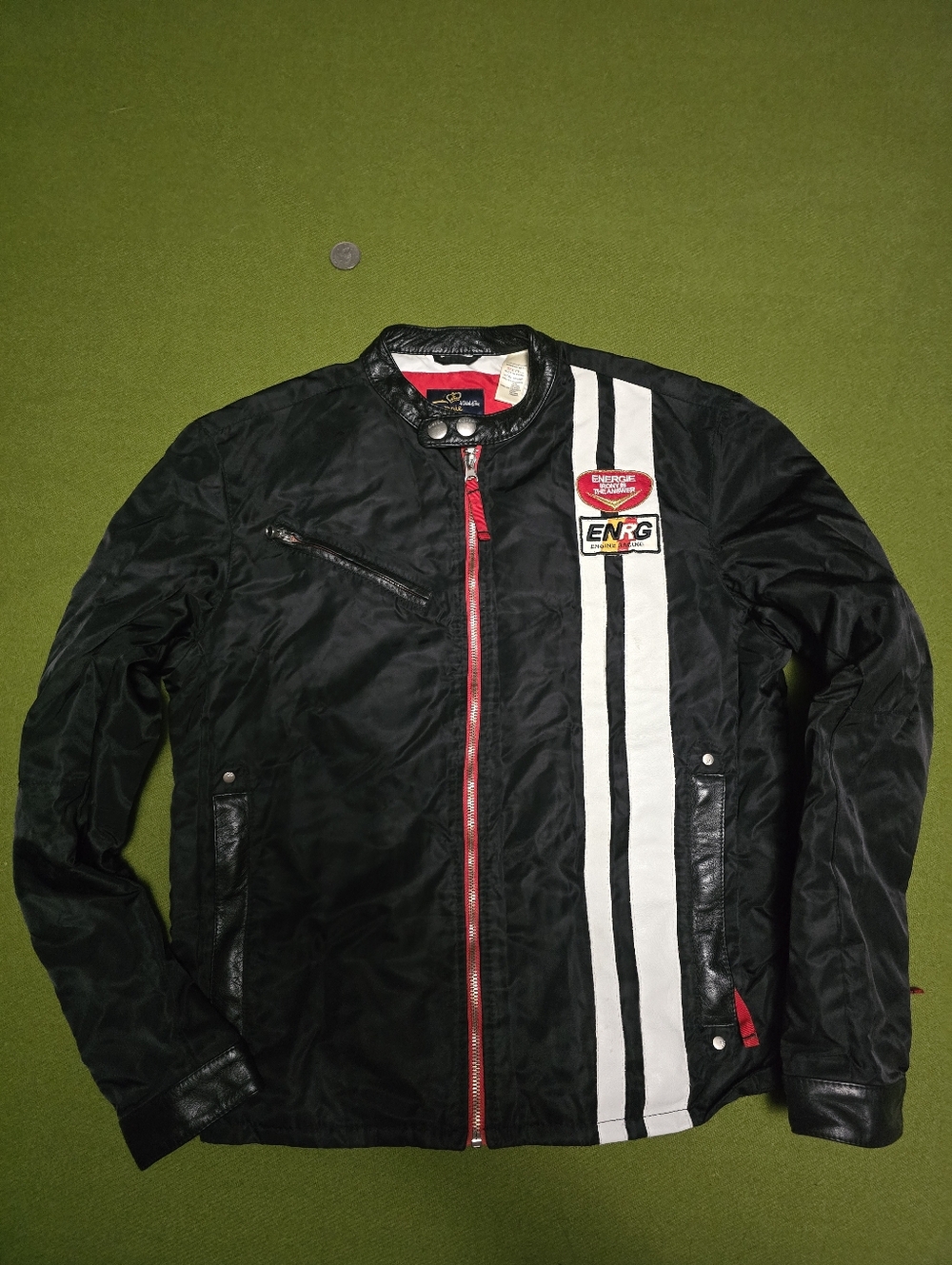 Vintage Energie brand jacket features racing-inspired patches and contrasting st